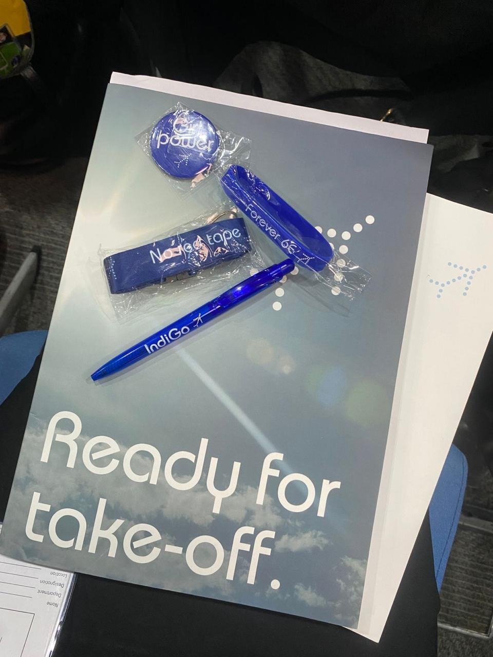Airline training onboarding kit with a ready for take-off notebook and branded stationery